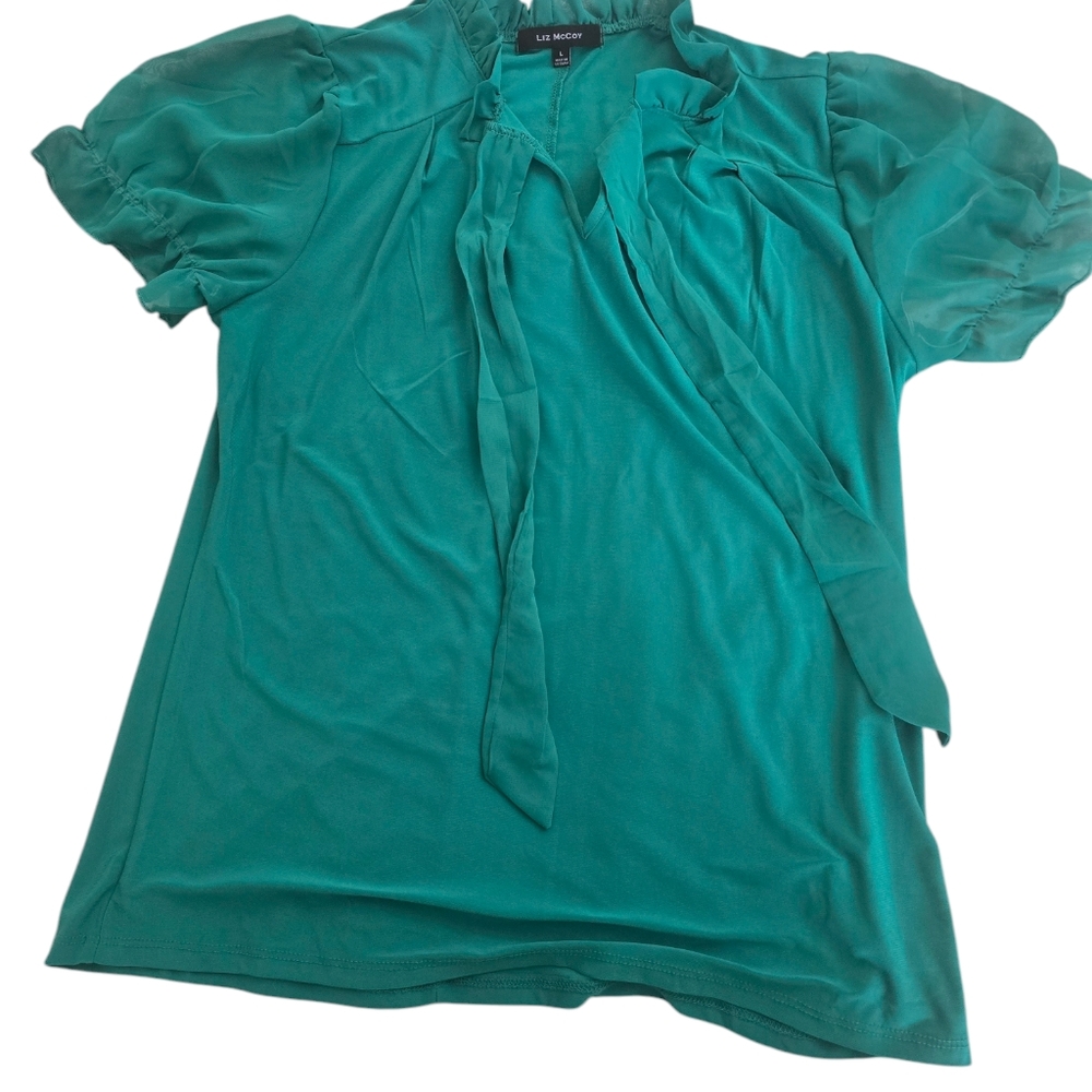 Yellow blouse green blouse and Grey pants